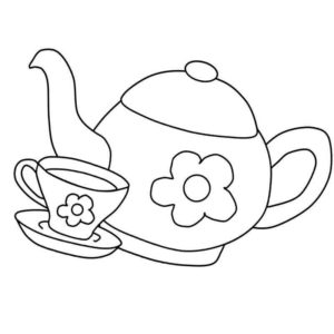 чайник с цветочком и чашкой чая
