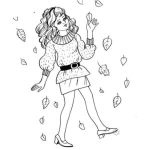 девушка идет под осенними листьями