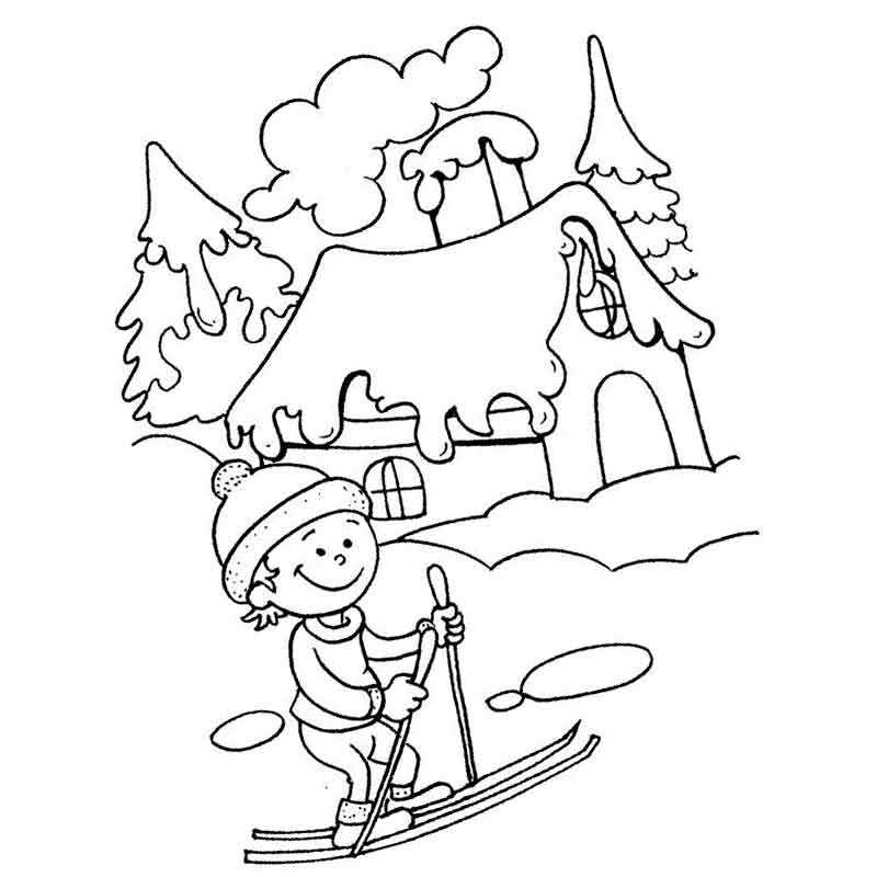 мальчик едет на лыжах зимой