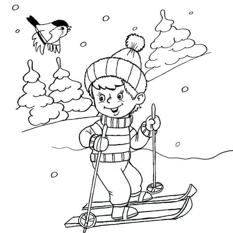 Зимние забавы мальчик катается на лыжах